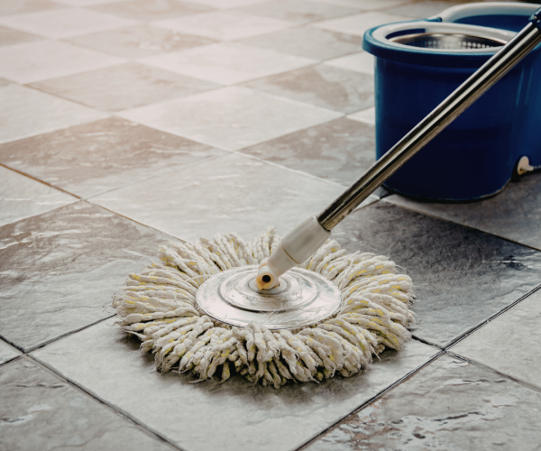 Tile Grout 101: How To Clean, Seal, And Maintain Your Tile Floors 3 Preparing Tile Floor For Safe Grout Cleaning By Using A Damp Mop